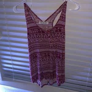 a red and white tank top